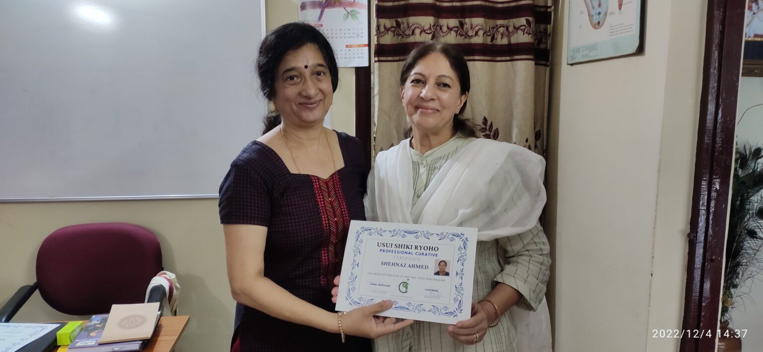 Shehnaz Ahmed receiving her Reiki Master certification from Smt Padma Srinivasan and Dr Latha Murli